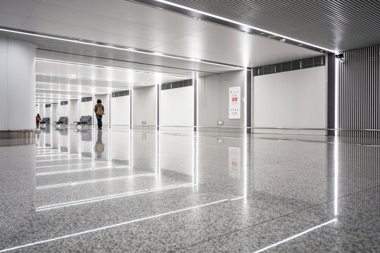 Pedestrians in modern subway station hall