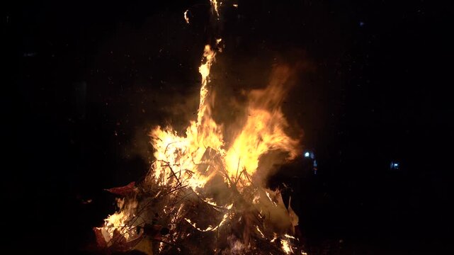 Huge bon fire being burnt on the hindu festival of Dussehra holi symbolizing victory of good over evil popular public event at night