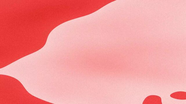 Abstract red background with subtle soft gradients and a blurry oval shape for creative digital projects