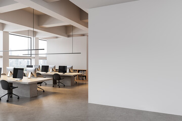 Modern open office interior with blank white wall for poster mockup or design template display,...
