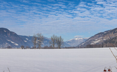 Winterlandschaft, wolkenstimmung, pinzgau, schnee, blauer himmel.