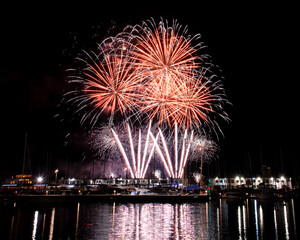 Fototapeta premium Vertical fireworks over Alicante marina at night, Spain