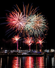 Fototapeta premium Vertical fireworks over Alicante marina at night, Spain
