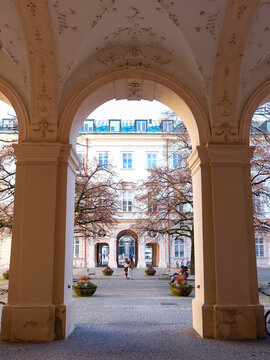 Mirabel Palace and its arch gate at he main entrance square door, Salzburg, Austria  