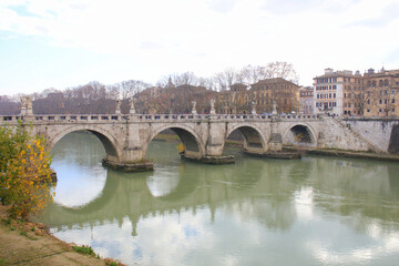 Obraz premium St. Angelo Bridge and the Trastevere district with River Tiber in Rome, Italy