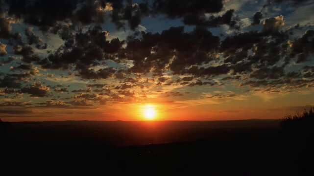 Inspirational Sunset with Sun and Clouds Zoom In Timelapse