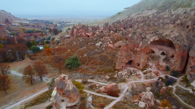 Aerial view Ancient city with cave houses in tuff stones of Cappadocia, Goreme national park of Turkey.
