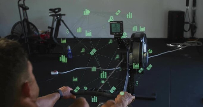 Male athlete starting rowing pushing legs pulling handle spawning green data icons tracking fitness