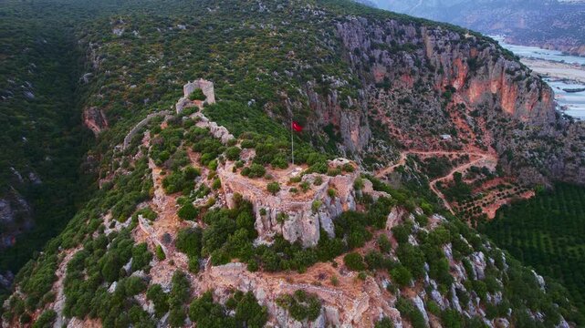 Ruins Myra Ancient City in Demre Antalya, flagpole with Turkish flag Aerial Top view..