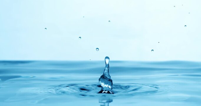 Drop of water falls into a drop of water in a super slow motion. Shot on super slow motion 1600 fps.