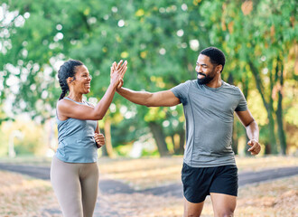 Obraz premium Couple jogging and running in a park healthy lifestyle