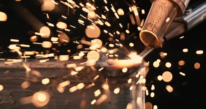 Laser welding machine. Shot on super slow motion camera 1000 fps. Laser welding is shown in close-up