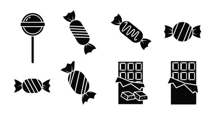 Assorted sweets and chocolate in a striking black silhouette © MDJAMAL