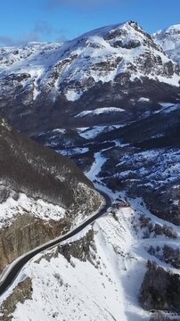Patagonia Road At Ushuaia In Tierra Del Fuego Argentina. Snowy Mountains. Glacier Landscape. Tierra Del Fuego Argentina. Winter Background. Patagonia Road At Ushuaia In Tierra Del Fuego Argentina.