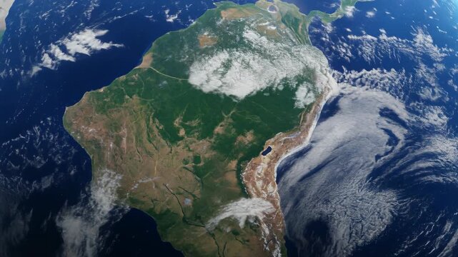 Detailed satellite view of South America with cloud formations and surrounding ocean on Earth from space