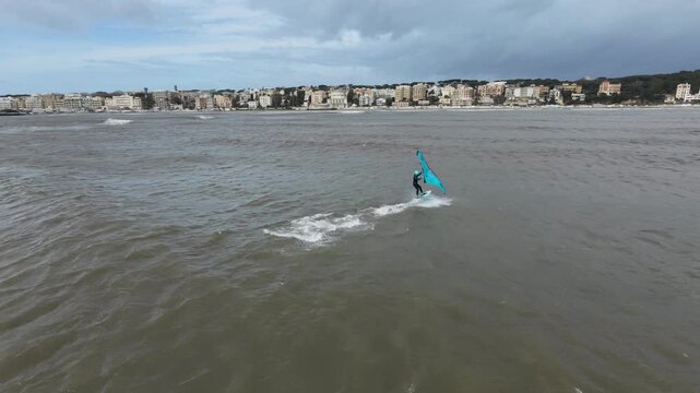 Wing Foiling Jumps and Tacks in Strong Wind Conditions and Perfect Big Waves