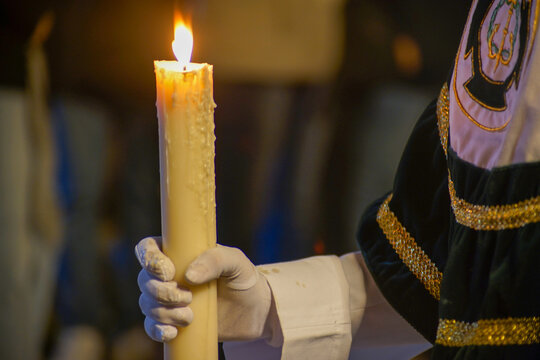 Candlelight Guiding the Silence of Holy Week