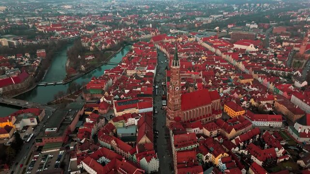 Aerial view of Landshut old town in Bayern Germany featuring Saint Martin Church tower. Historic Gothic architecture and red roofs of the Stiftsbasilika St Martin in the city center of Lower Bavaria