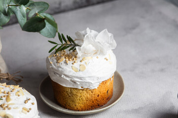 Traditional Easter cakes and painted eggs in white colors .Easter Kulich	