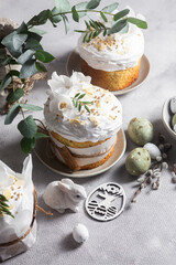 Traditional Easter cakes and painted eggs in white colors .Easter Kulich	