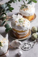 Traditional Easter cakes and painted eggs in white colors .Easter Kulich	
