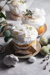 Traditional Easter cakes and painted eggs in white colors .Easter Kulich	
