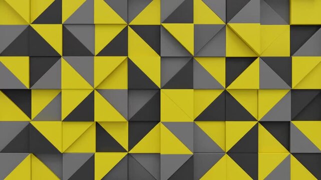Dynamic geometric pattern with matte yellow and dark grey triangular facets creating a textured, abstract visual effect