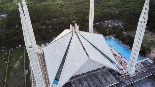 Aerial View of Faisal Mosque with Courtyard and Green Hills in Islamabad, Pakistan