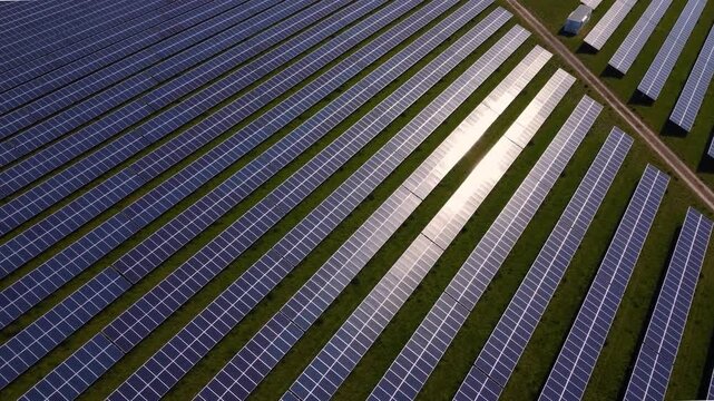 Macro Texture of Polycrystalline Silicon Solar Cell showing Photovoltaic Wafer Grid and Sun Flare Reflection for Clean Energy Technology