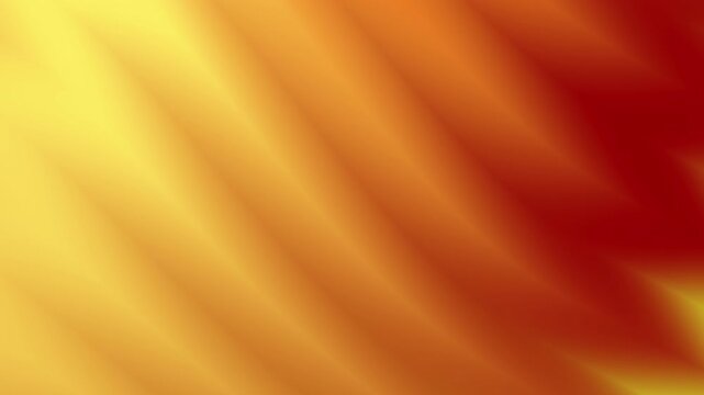 Abstract blurred gradient image in yellow and red suitable for backgrounds, presentation slides, graphic design projects, and digital artwork.