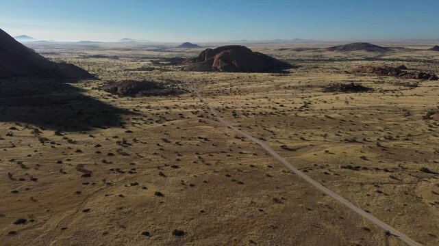 Landscape around Spitzkoppe, aka Spitzkop, with massive granite rock formations, Namib Desert in Namibia, Africa