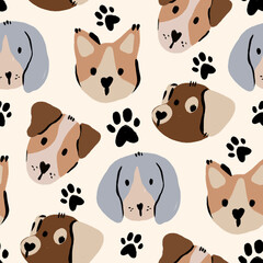 Seamless pattern with hand drawn cute puppy dogs and black paw prints on cream background in brush stroke style for textile and nursery wallpaper © Marie
