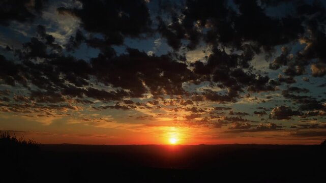 Inspirational Sunset with Sun and Clouds Zoom In Timelapse