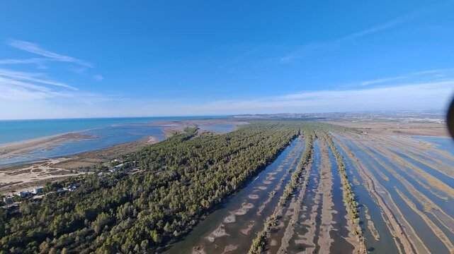 Aerial view of Divjake Karavasta area in Albania showing wetland biotope with large bird colonies, lagoons, and protected natural habitat