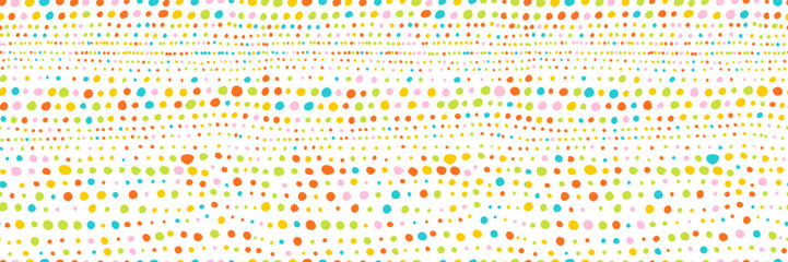 Obraz na płótnie Canvas Naive polka dot childish seamless pattern. Hand drawn speckles and colorful spots banner background. Birthday party random circles seamless pattern or wrapping paper. Polka dot backdrop.
