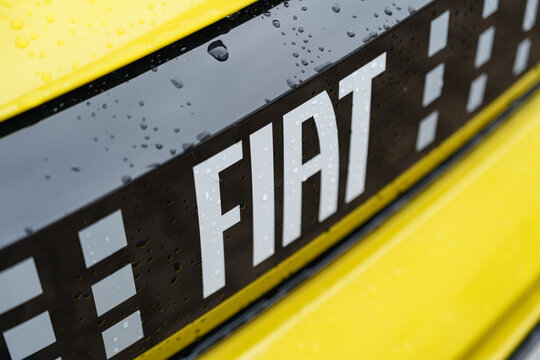 Fiat logo on the front of a Grande Panda model parked outside of the dealership