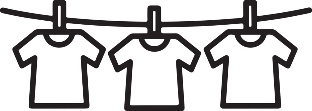 T shirts hanging on a clothesline black and white