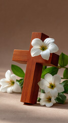 Fototapeta premium Wooden cross with flowers on plain indoor background