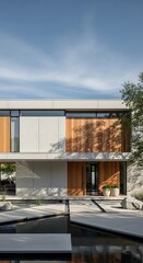 Obraz premium Modern house with large windows and pool.