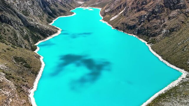Stunning aerial view of the turquoise waters of Laguna Par&oacute;n, with snow-capped peaks of the Cordillera Blanca in Huaraz, Peru.	