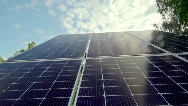 Macro Texture of Polycrystalline Silicon Solar Cell showing Photovoltaic Wafer Grid and Sun Flare Reflection for Clean Energy Technology