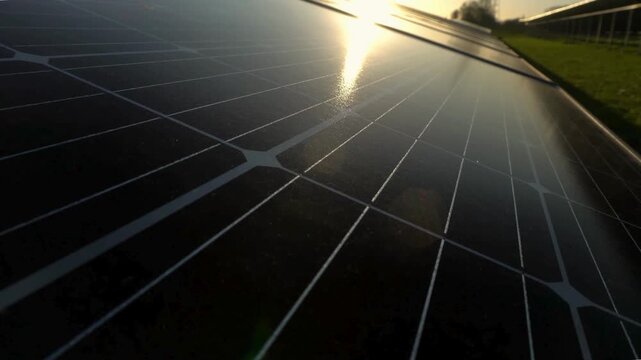 Macro Texture of Polycrystalline Silicon Solar Cell showing Photovoltaic Wafer Grid and Sun Flare Reflection for Clean Energy Technology