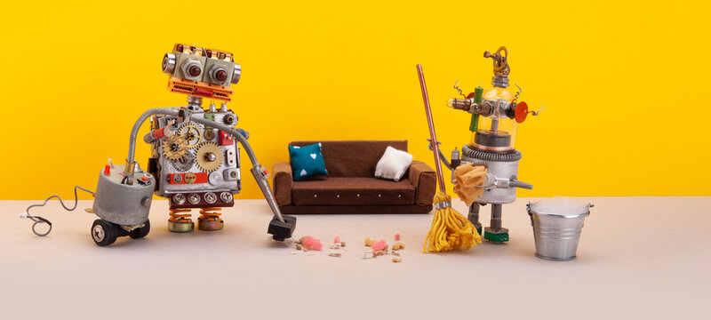 Mopping sweeping vacuuming cleaning service. Robots houseworkers vacuum cleaner, buckets rag, mops and garbage on the floor.  Yellow wall beige floor background.