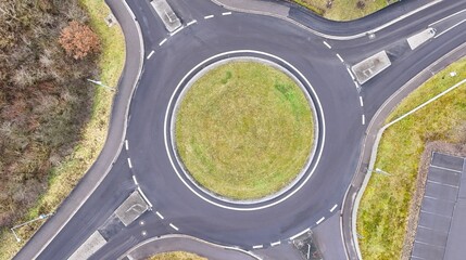 Aerial Top View of Empty Roundabout and Road Intersection	
