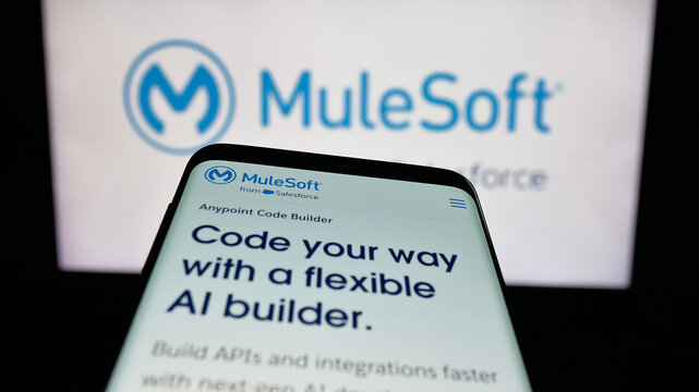 Stuttgart, Germany - 01-26-2026: Mobile phone with website of US integration software company MuleSoft LLC on screen in front of logo. Focus on top-left of phone display.