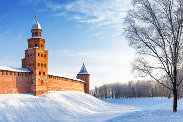 The Kokuy Tower of the Novgorod Kremlin on a cold winter day in Veliky Novgorod, Russia. The Kremlin wall in Veliky Novgorod during a frosty winter sunset.