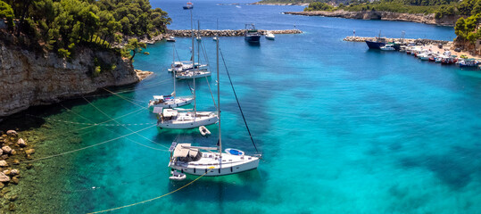 Aerial Top Down View of Sailing Boats in Turquoise Bay &mdash; Crystal Clear Emerald Water of Patitiri, Alonissos Marine Park Sporades Greek Islands