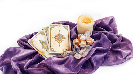 Watercolor painting on a white background. Tarot cards, candle, crystals, purple fabric.