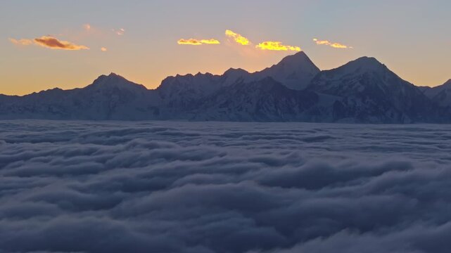 Breathtaking Sunset Glow Over Mount Gongga and Sea of Clouds in Western Sichuan