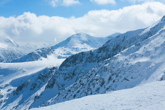 View on top of Pirin mountains from cable car, ski resort Bansko, Bulgaria.